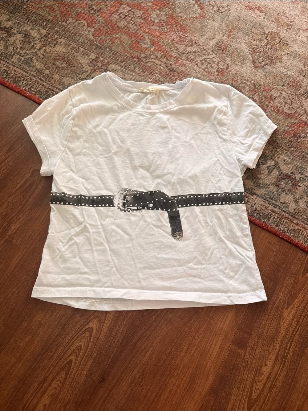 White Graphic Tee with Black Studded Belt Print